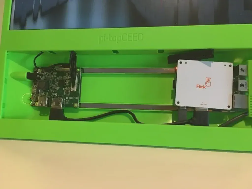 I had to disable the pi-top power supply to the Raspberry Pi to fit the Flick HAT.